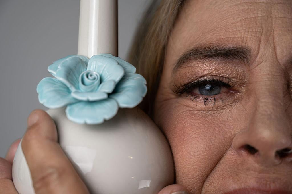 Grandmother posing with My Bud Vase Aqua Rosette Vase Bong next to Blue Eye 